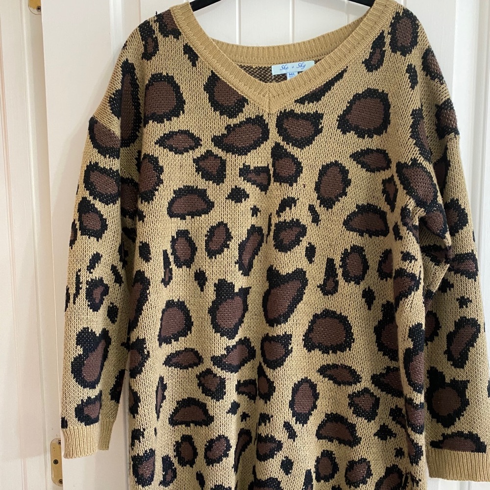 She + sky leopard print sweater dress.  Size M/L.